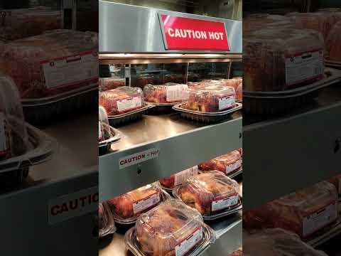 Why Costco Keeps Its Rotisserie Chickens In The Back of The Store